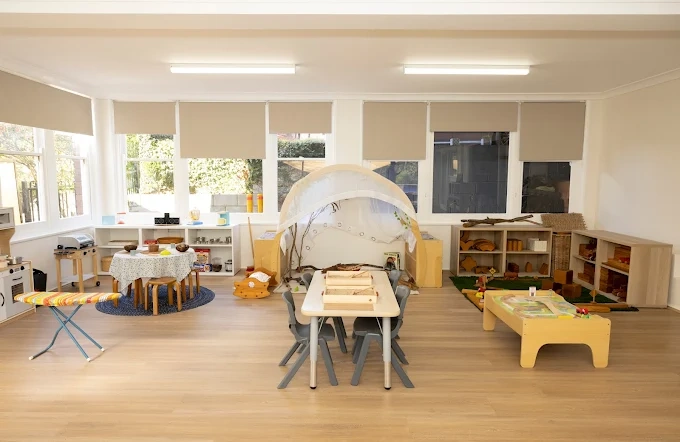 eastwood blessing child care interior with play table and kitchen playset